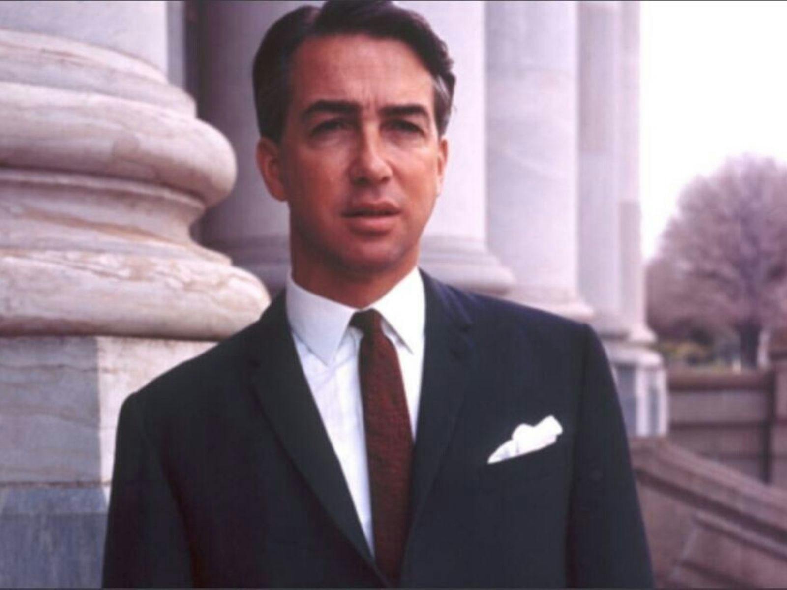 Don Dunstan, standing on the steps of Parliament House, Adelaide