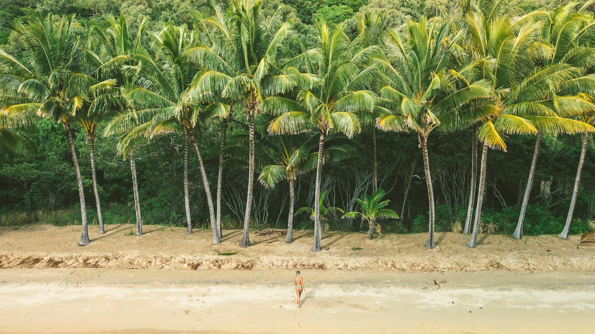Woman walking at Ellis Beach