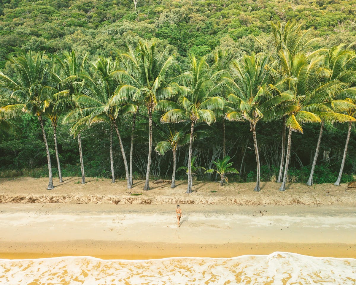 Woman walking at Ellis Beach