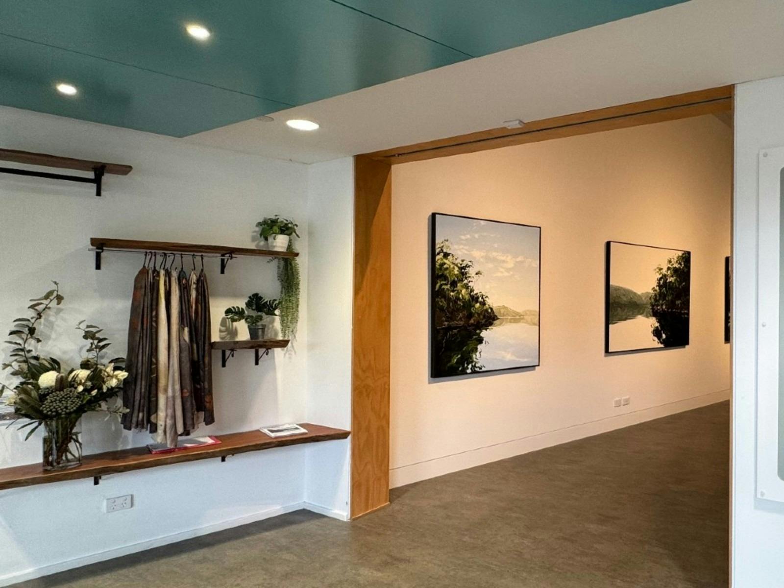 A display of merchandise at the entrance to an exhibition gallery.