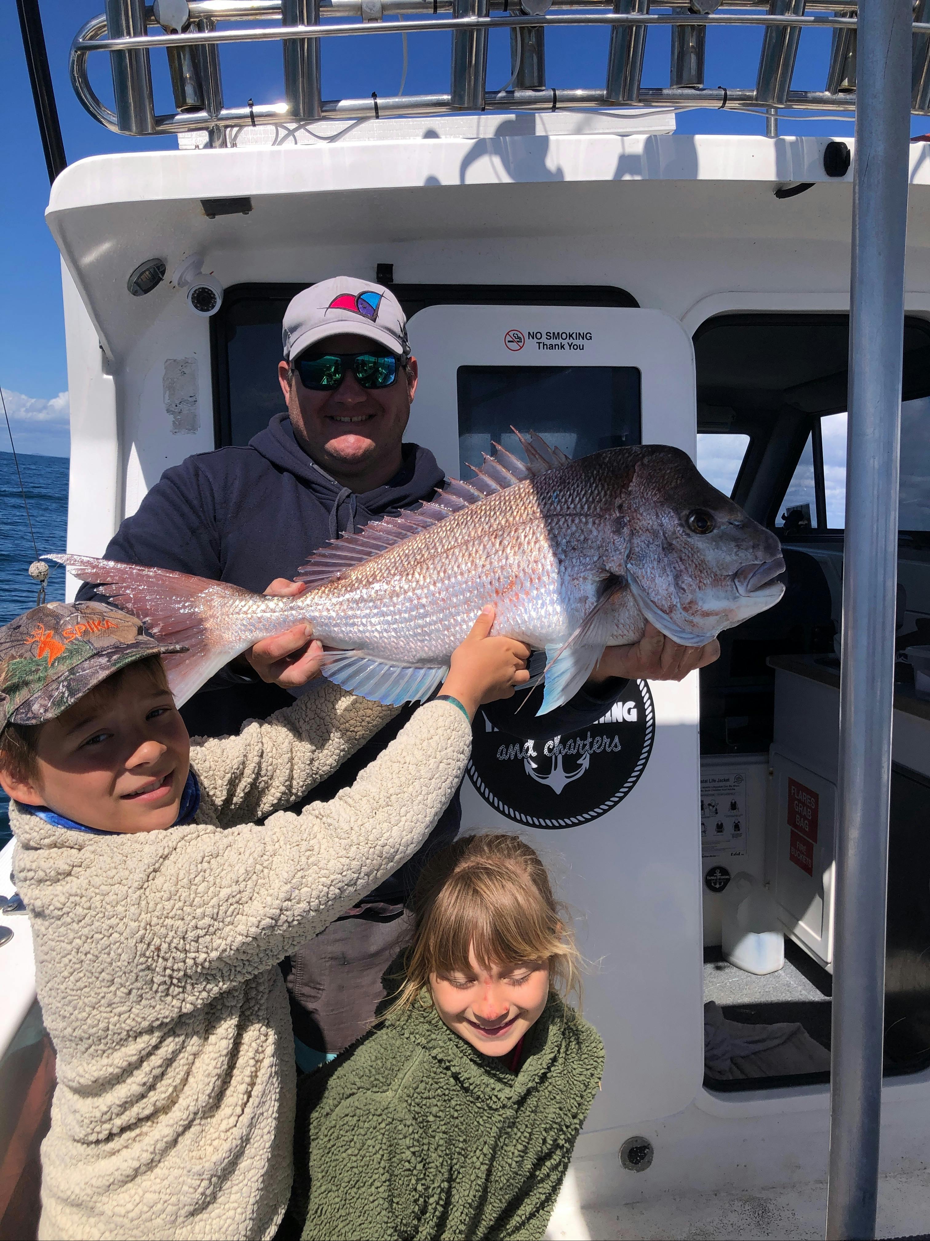 A 4.5 kilo snapper for Rowan with his proud son.