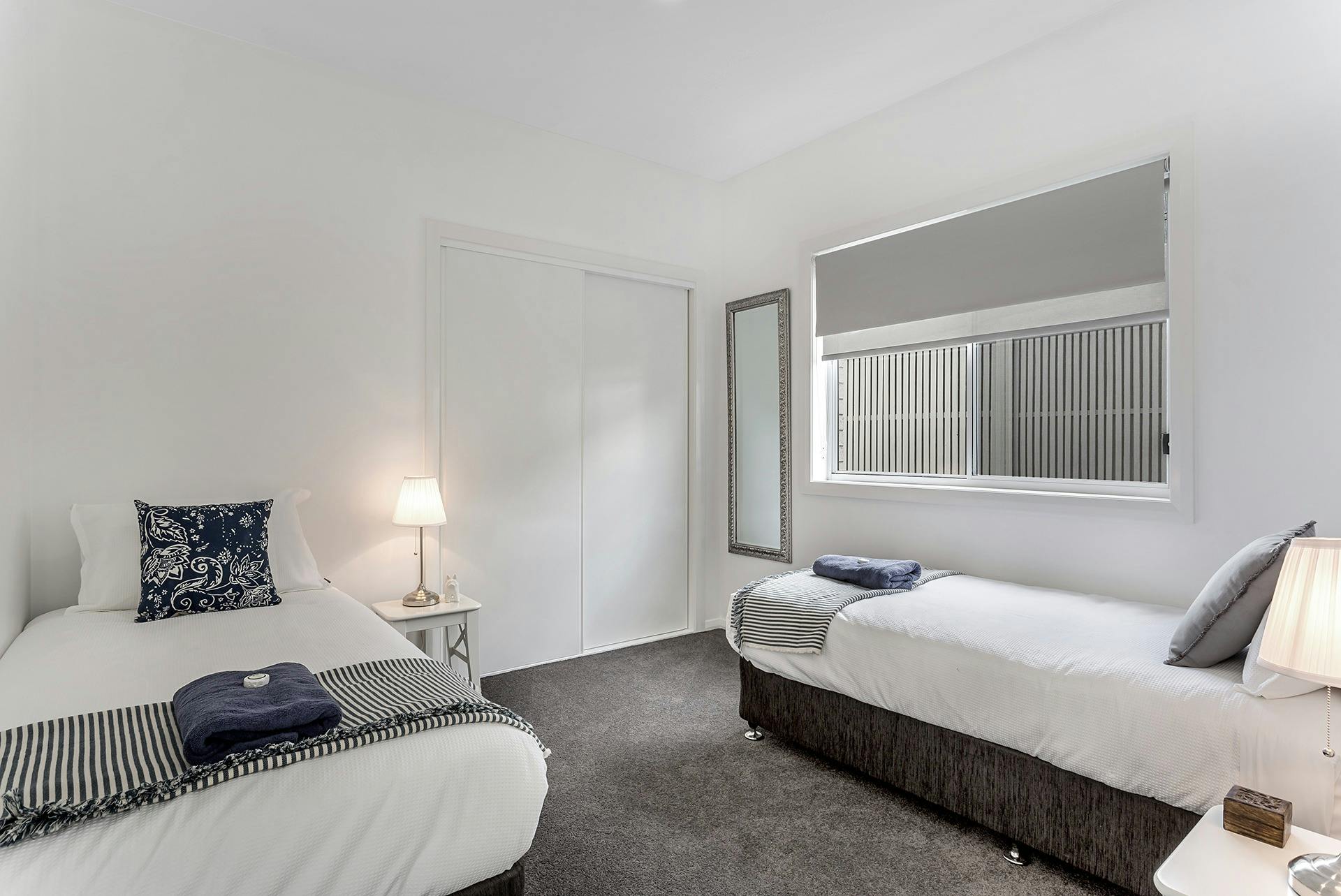 Twin bedroom with lux linen