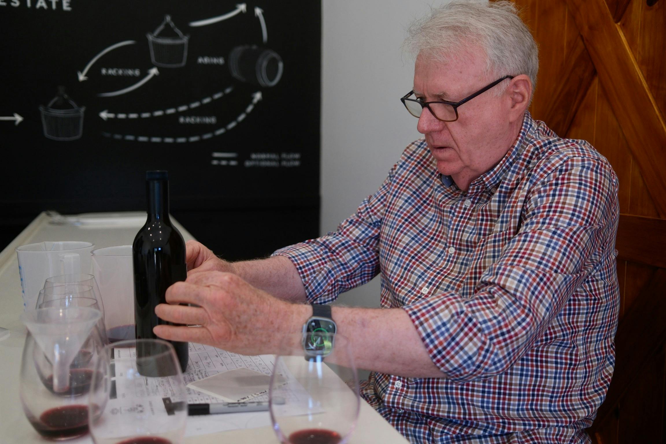 Labelling wine bottle