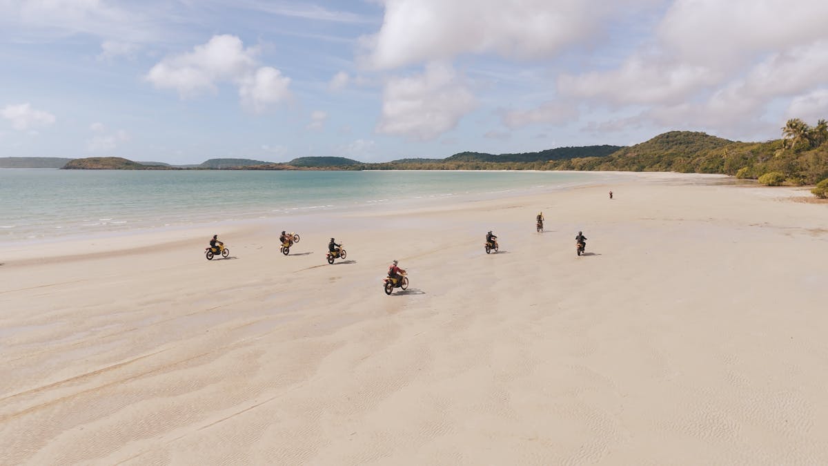 Bikes riding on a beach in Cape York