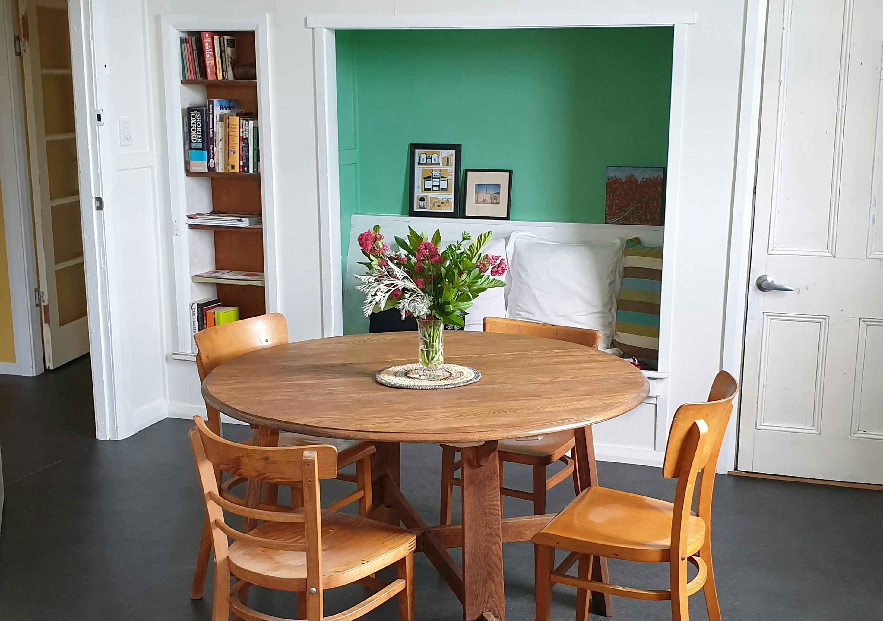 Dining table and four chairs in the upstairs dining area