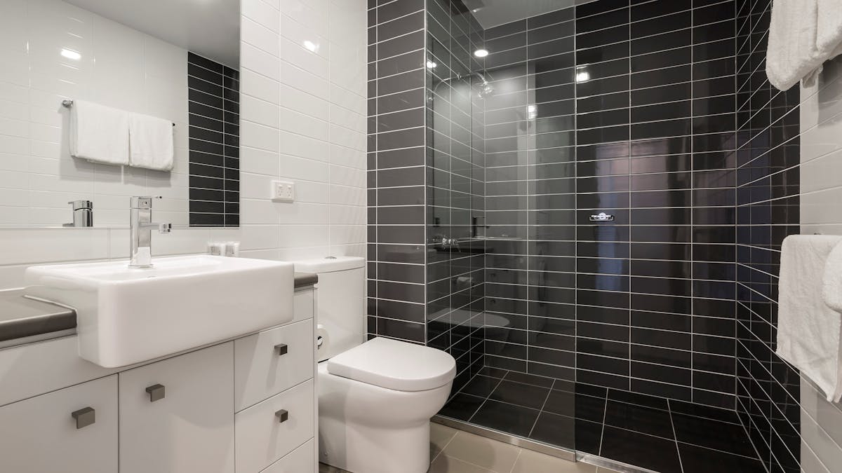 Modern ensuite bathroom with walk in shower. Modern ensuite bathroom with walk in shower.
