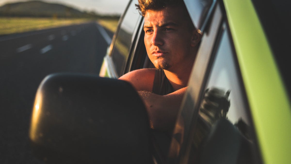 Man looking out of campervan