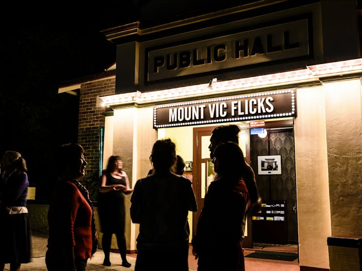 Mount Vic Flicks at night.