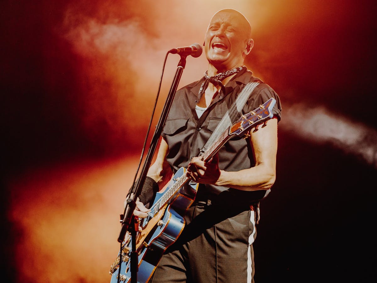 Singer Diesel playing guitar