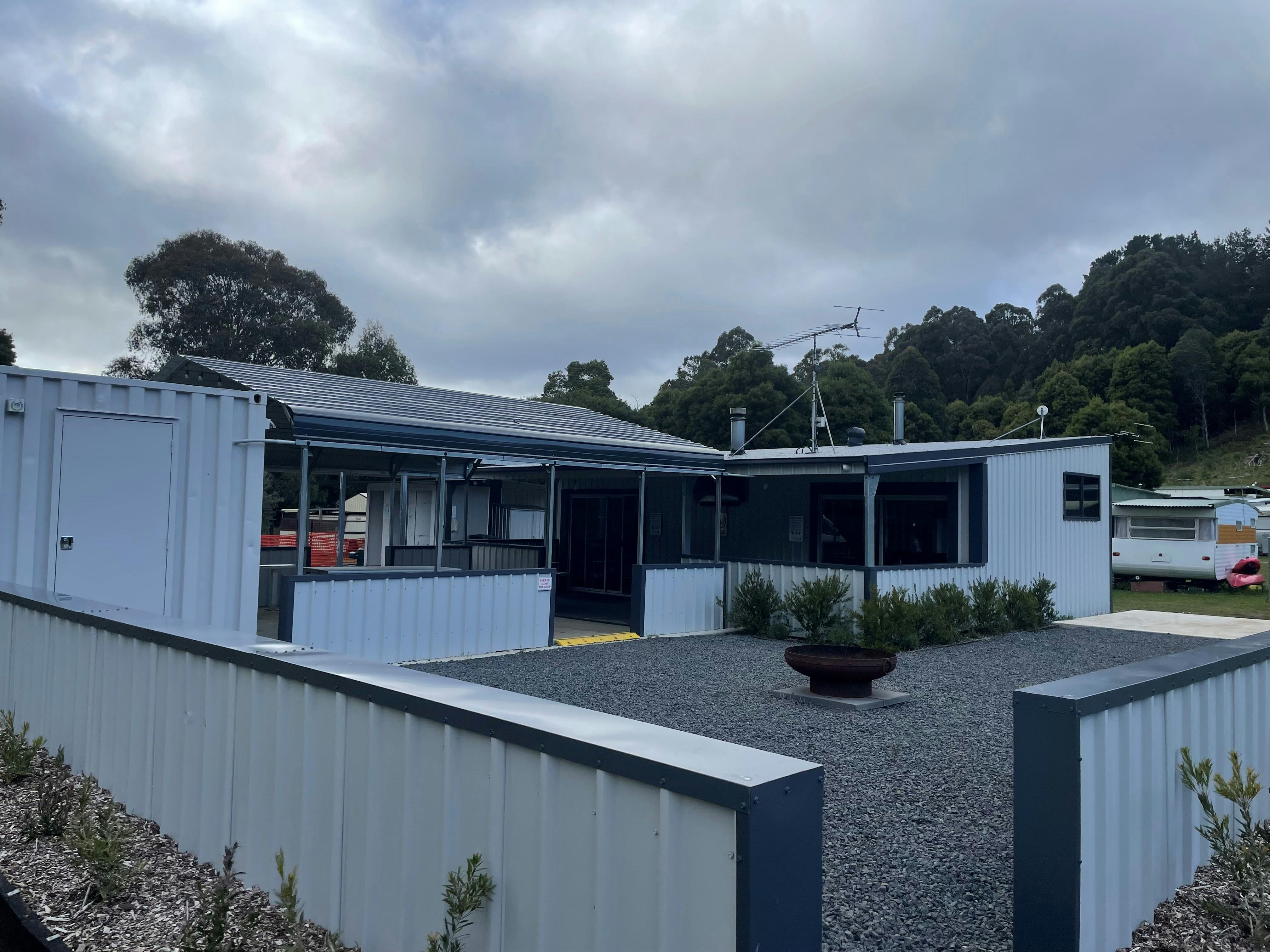 Wet area with firepit looking into the camp kitchen