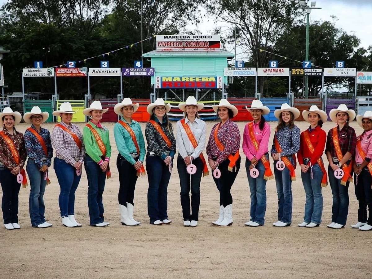 Rodeo Queens stand in a line at the Mareeba Rodeo in Mareeba, Far North Queensland.