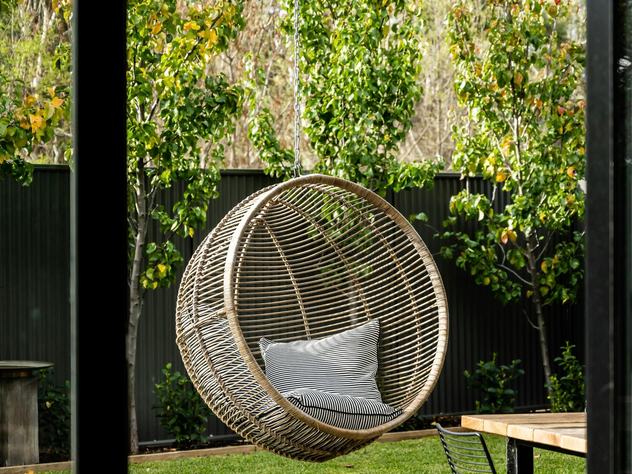 Hanging chair in garden. Vale 194 luxury holiday accommodation