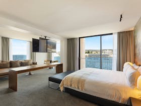 Executive Waterfront Suite - the view and bedroom