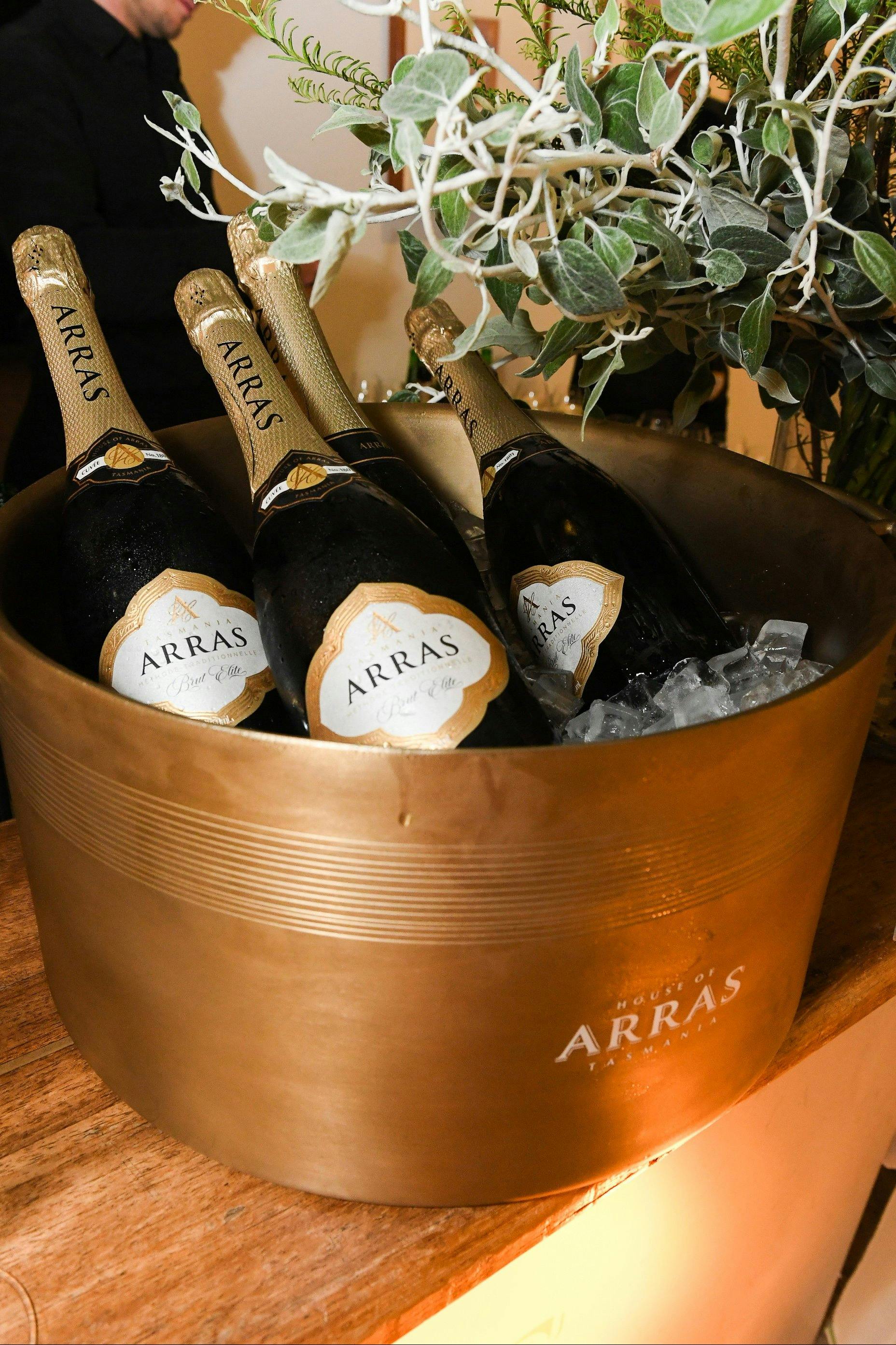 Bottles of House of Arras sparkling wine in an ice bucket