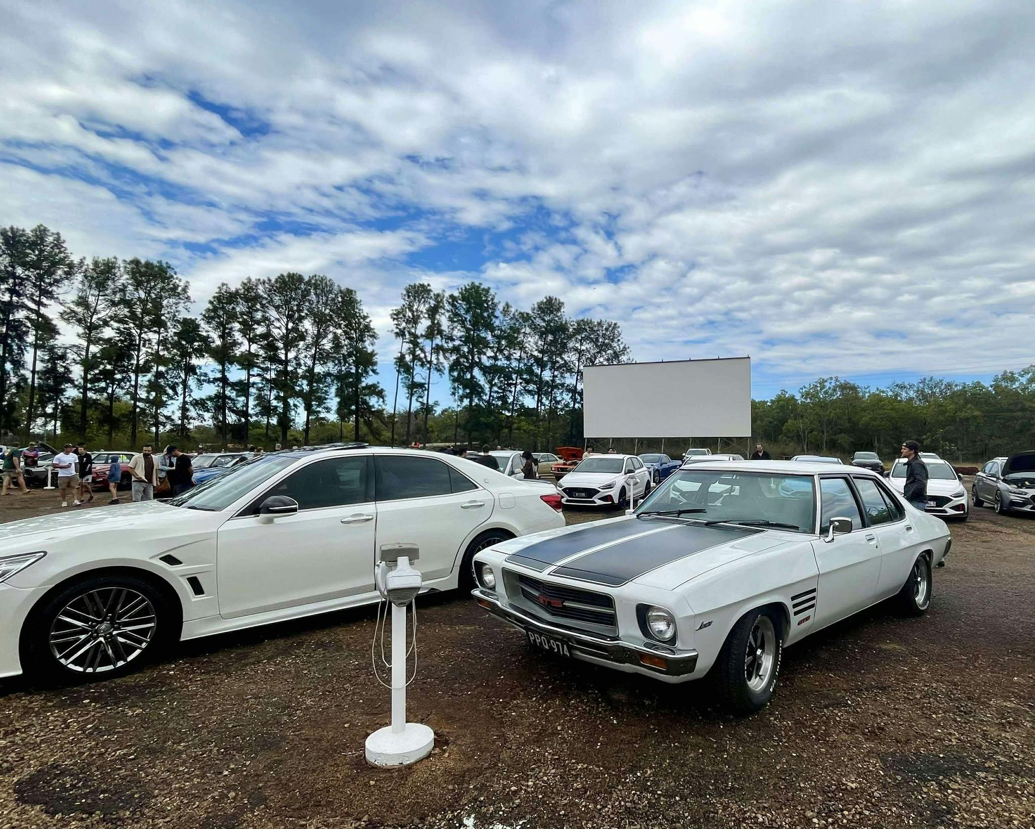 Classic Cars parked at the Mareeba Drive In before a movie screening
