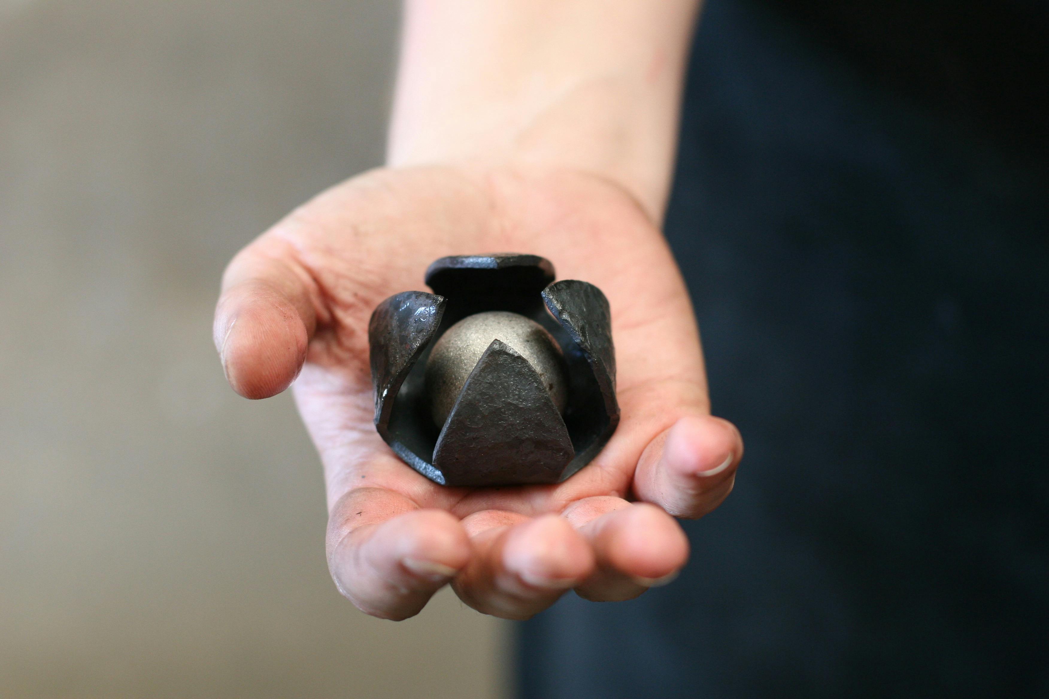 A handmade metal fidget crafted during the blacksmithing workshop for neurodivergent people.