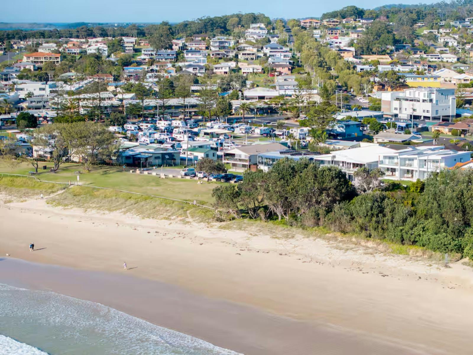 Woolgoolga Beach in foreground, Pure Aqua to the bottom right of image just metres away