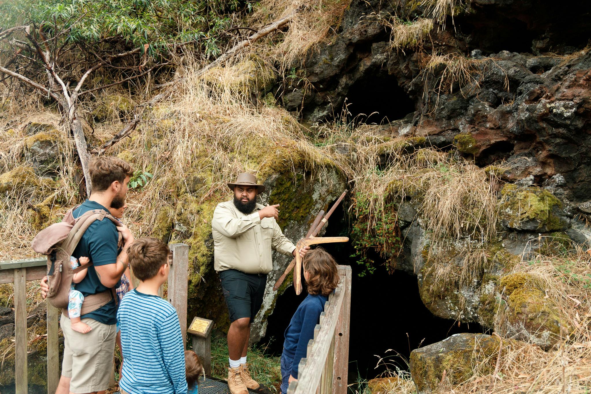Aboriginal guide at cave entrance