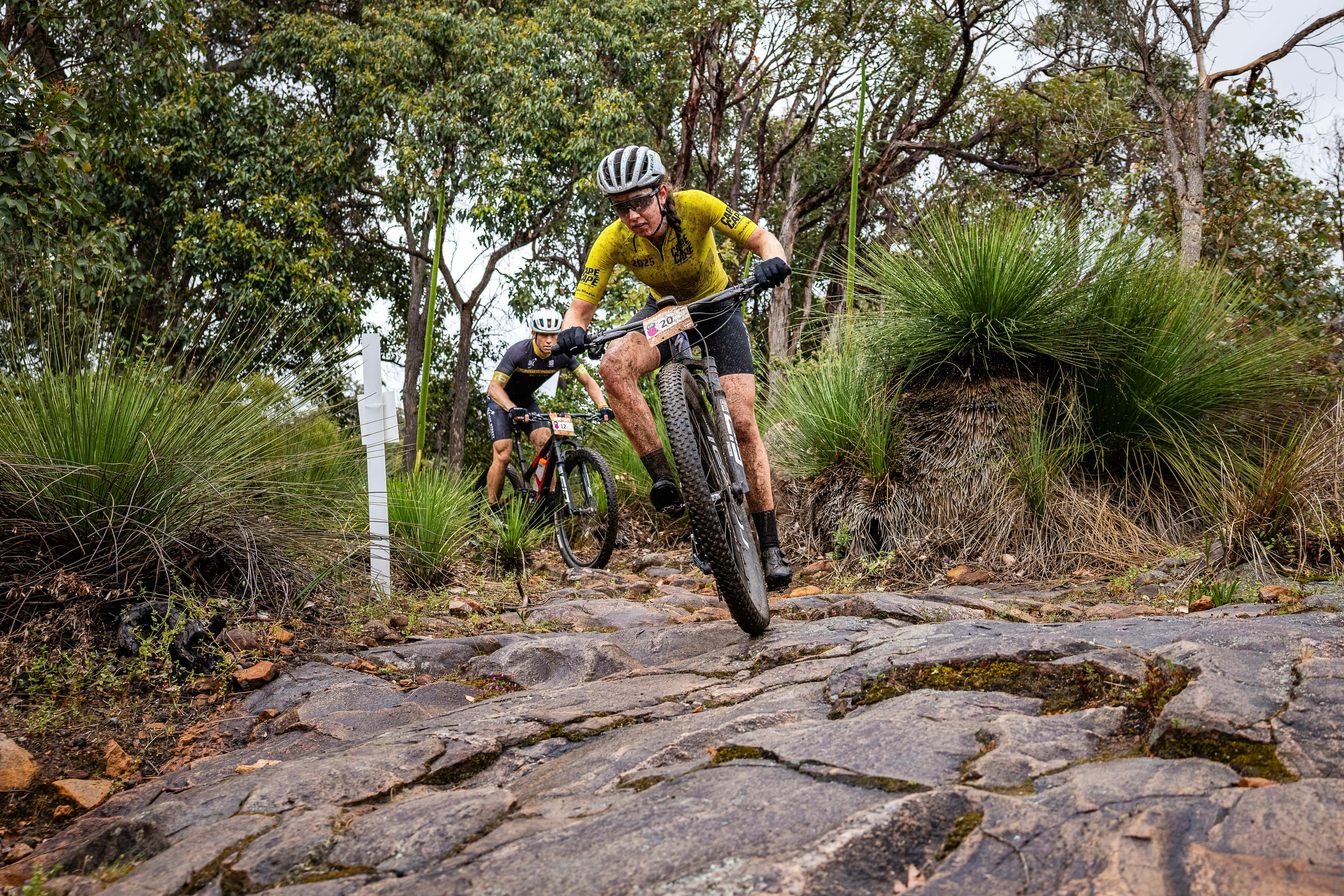 Female Rider, riding down a rock face.