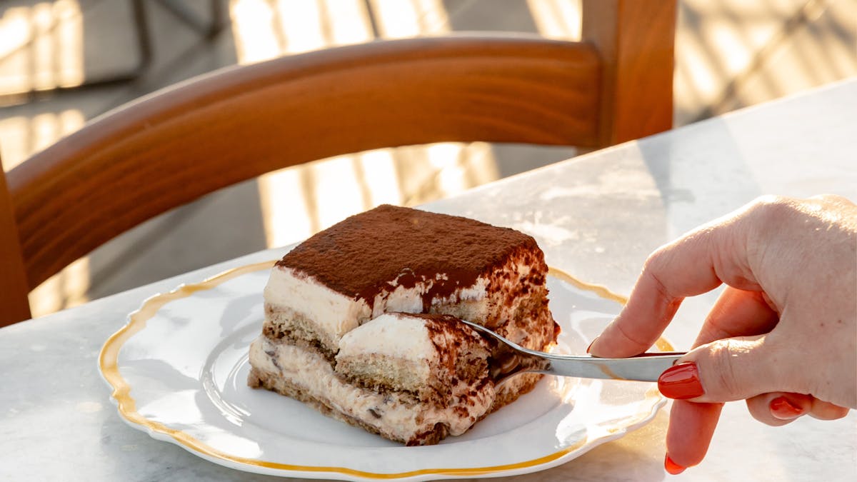 Spoon going into tiramisu