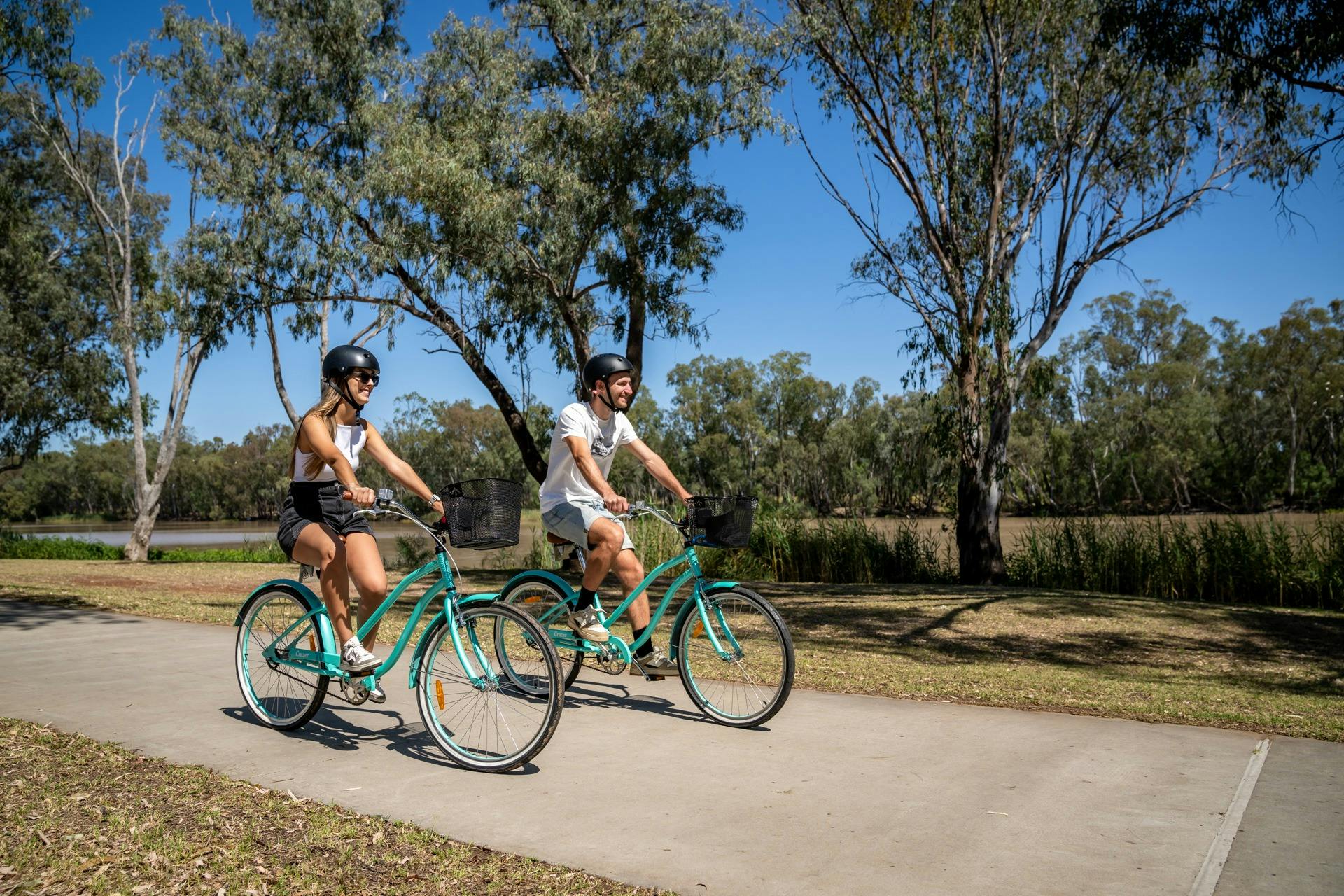 bikes being ridden on river