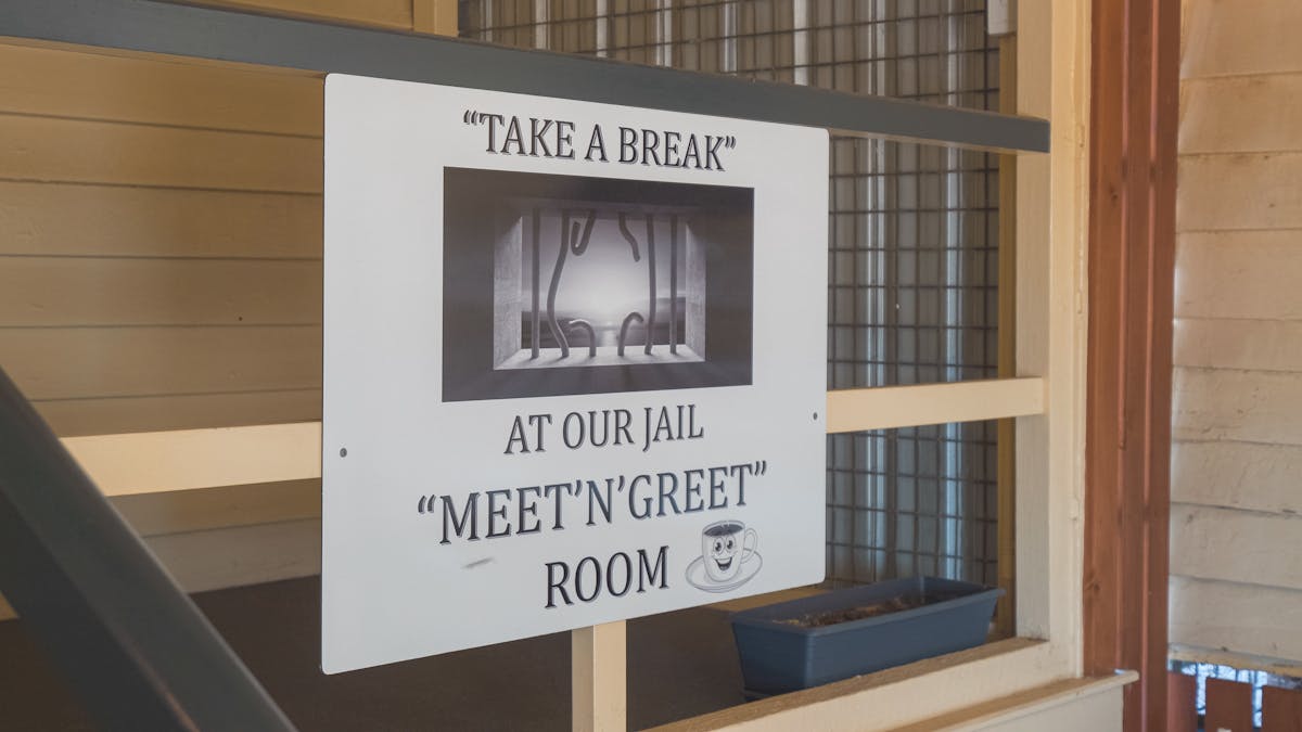 Sign at Visitor Information Centre Take a break at our Jail Meet n Greet room