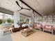 silver house,  living room area with couches, chairs, tea table and a ceiling fan