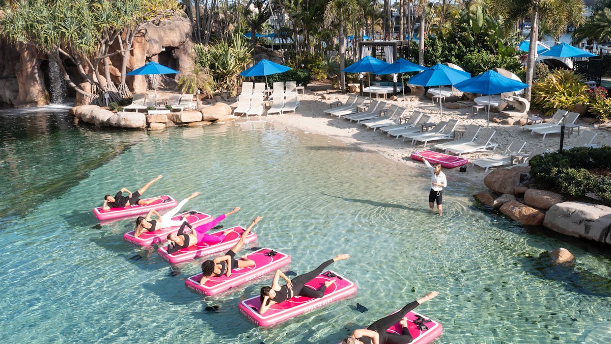 Group of women doing Aqua Sculpt Floating Pilates experience at JW Marriott Gold Coast Resort & Spa