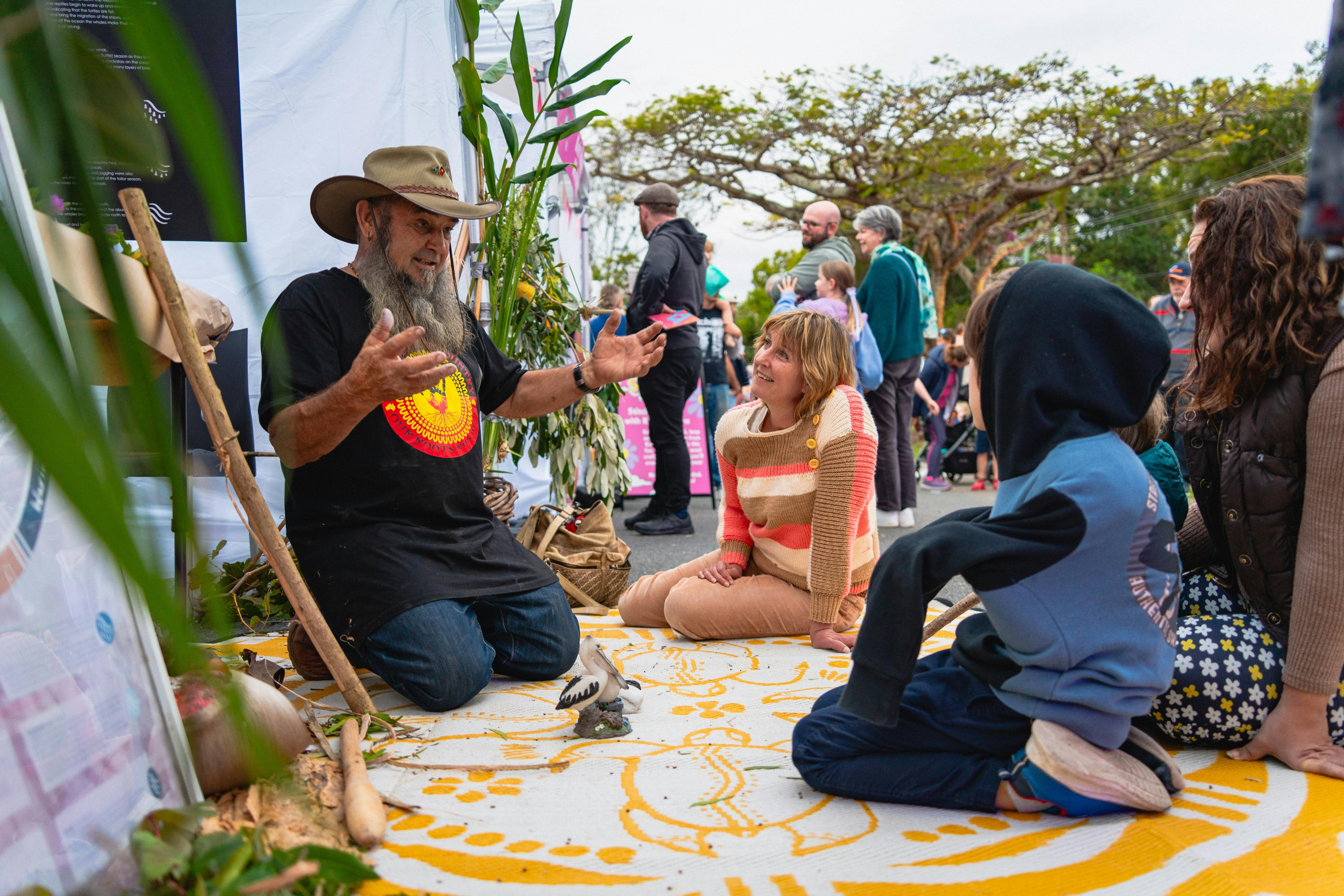 Uncle Franc teaching children about Country.