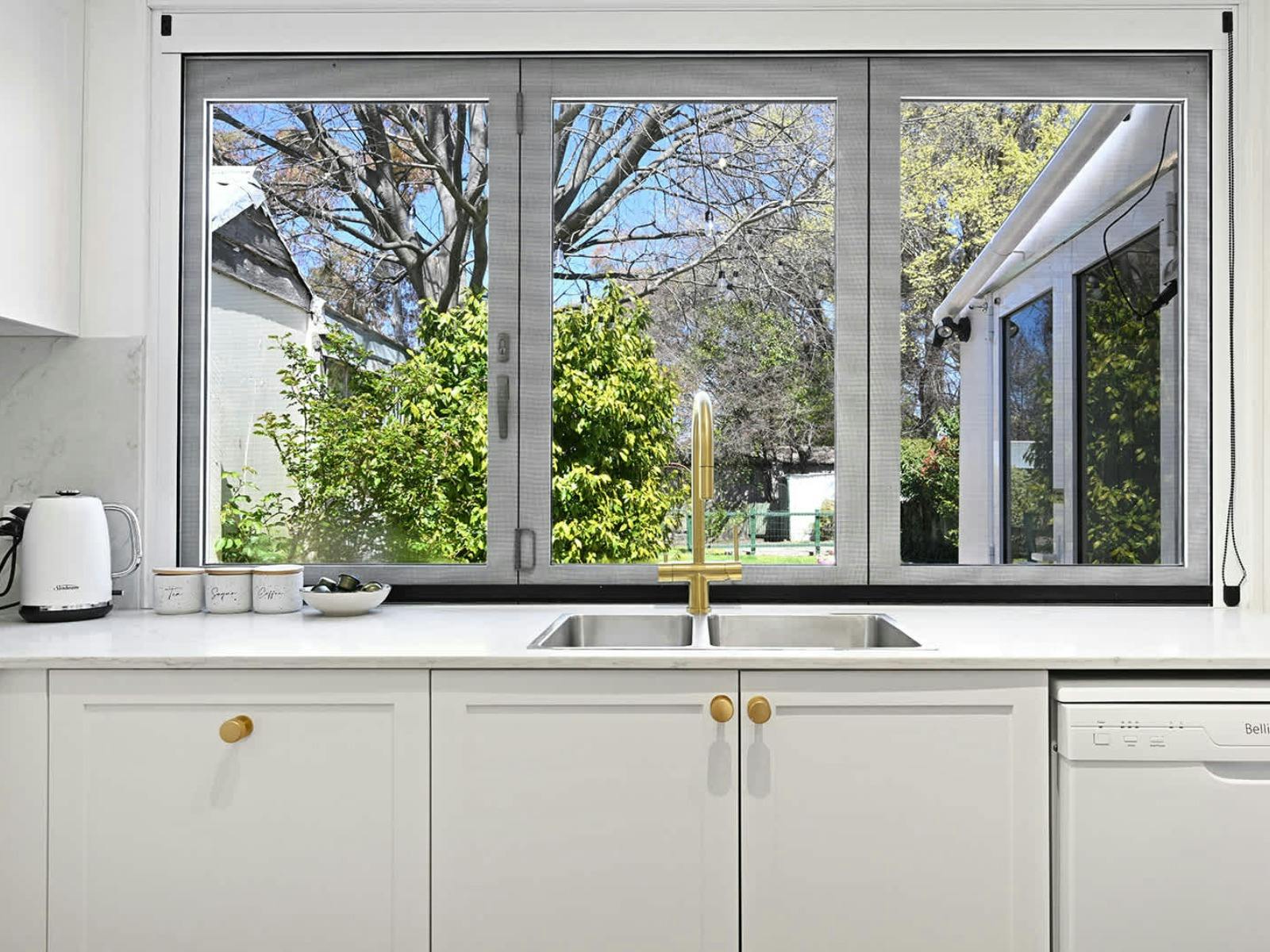 Kitchen with large window, kitchen sink
