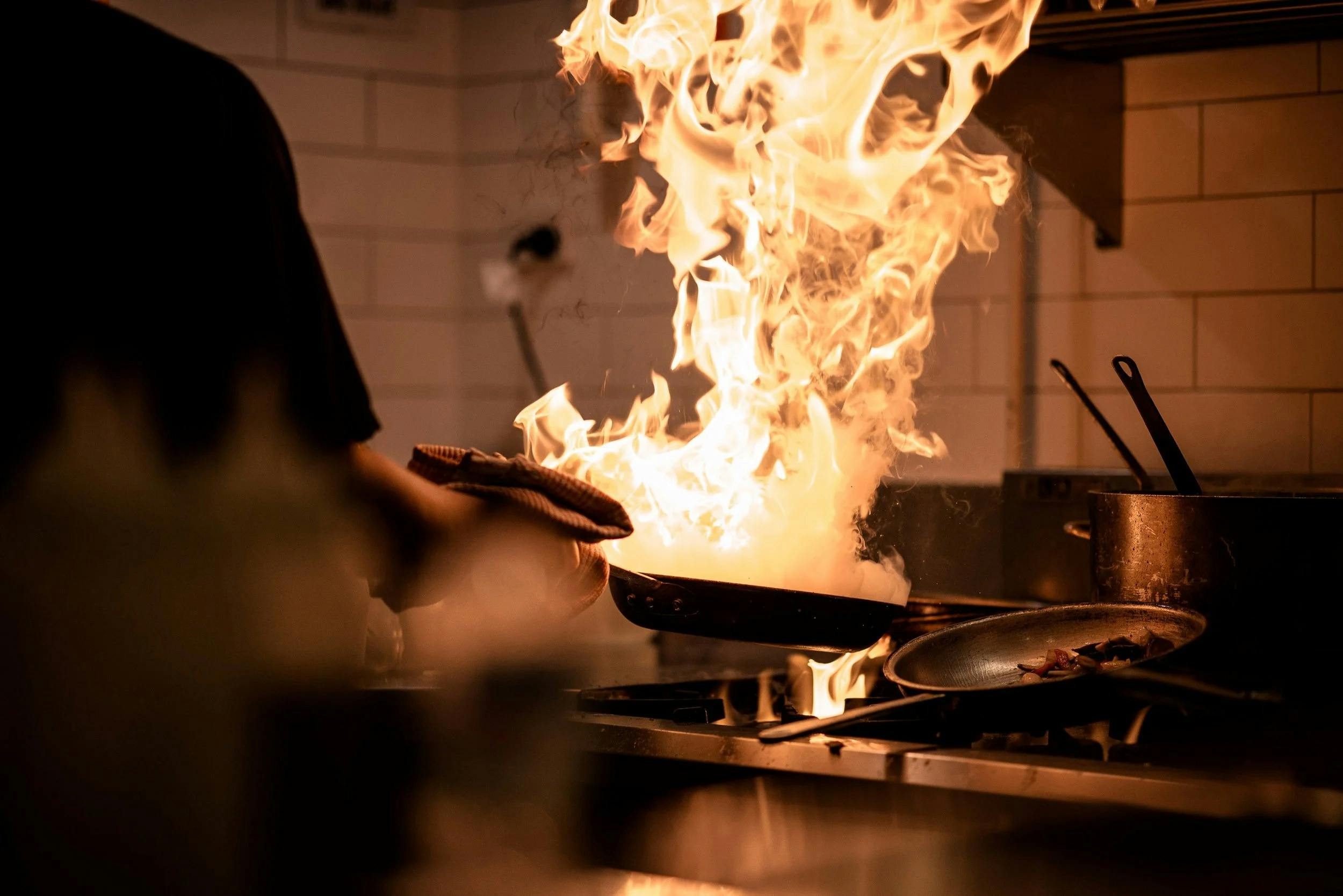 Verona chef cooking with fire