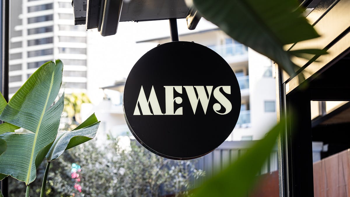 Mews signage outside venue