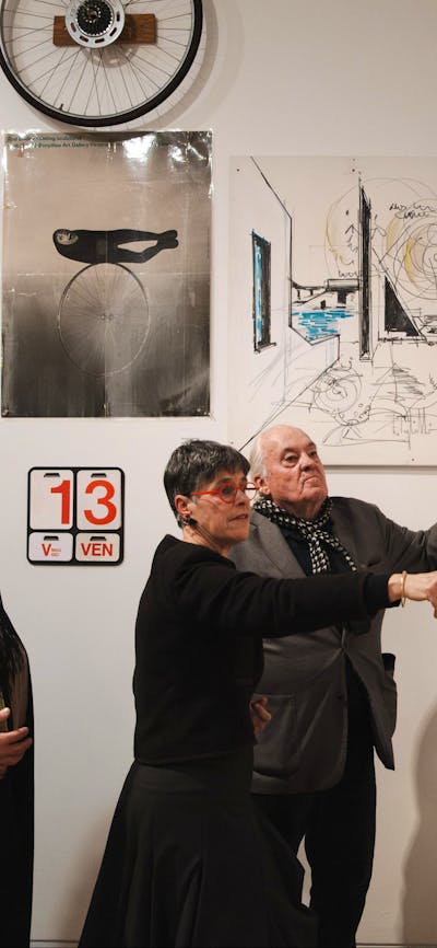 People exploring the Taglietti exhibition