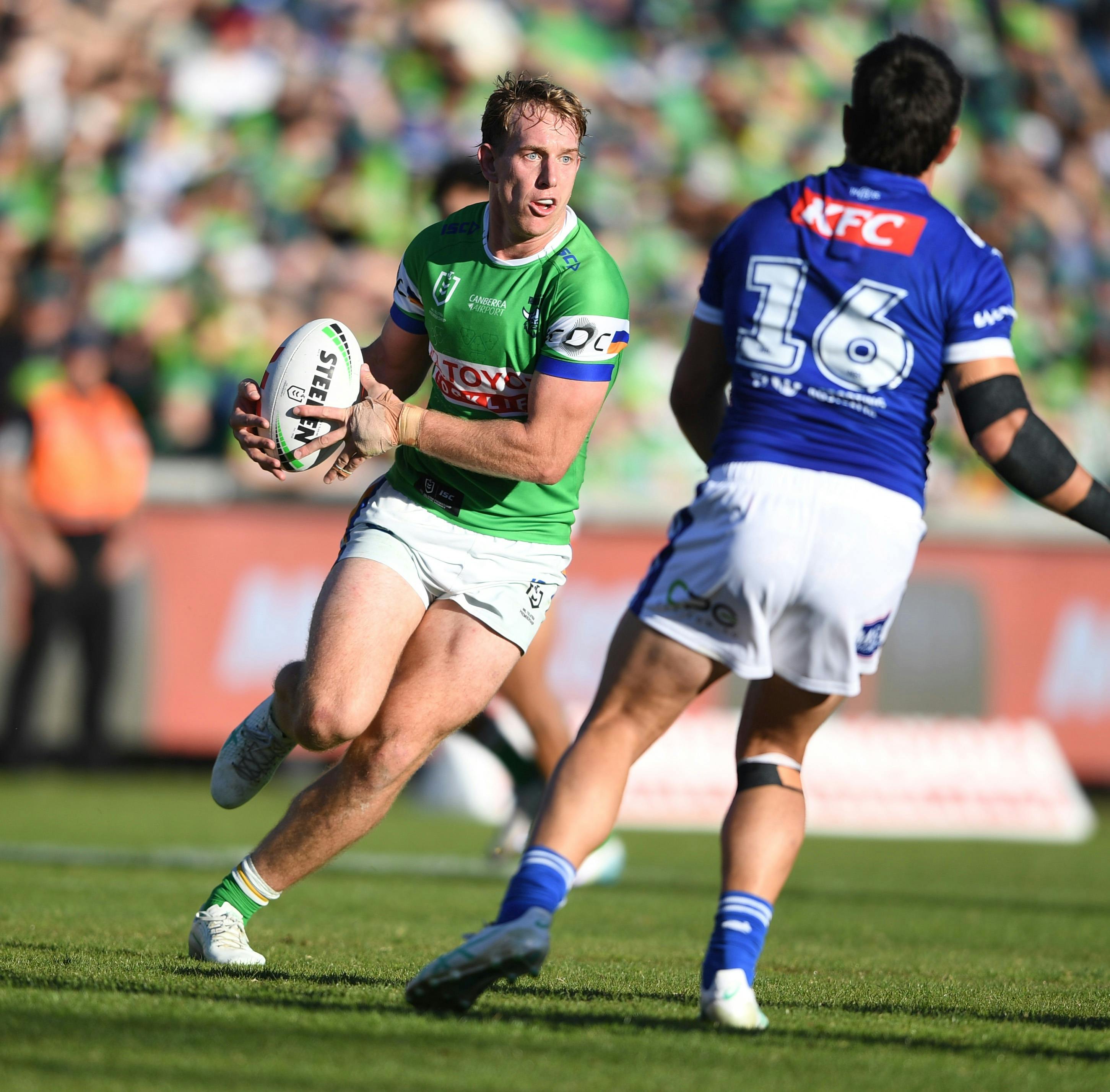 Canberra Raiders player Zac Hosking running the ball.