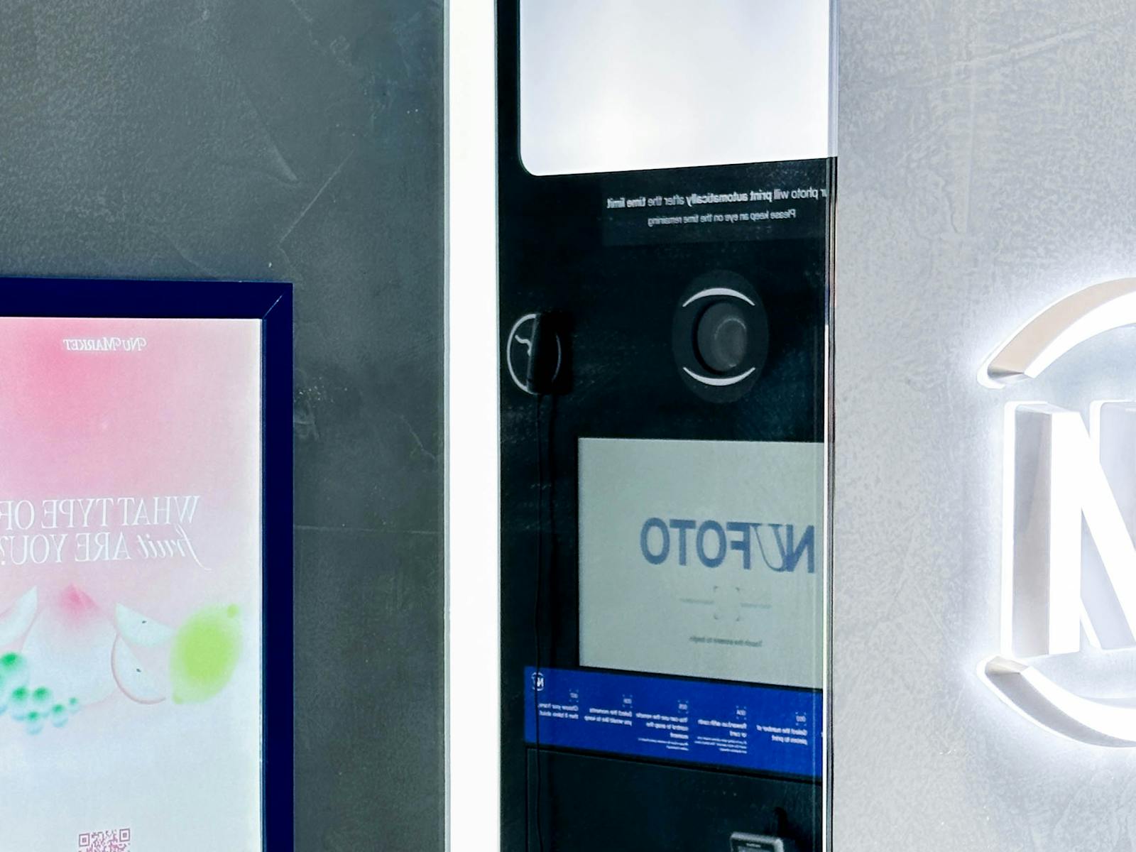 A peak into our booths, shows a reflection of our devices in the mirror