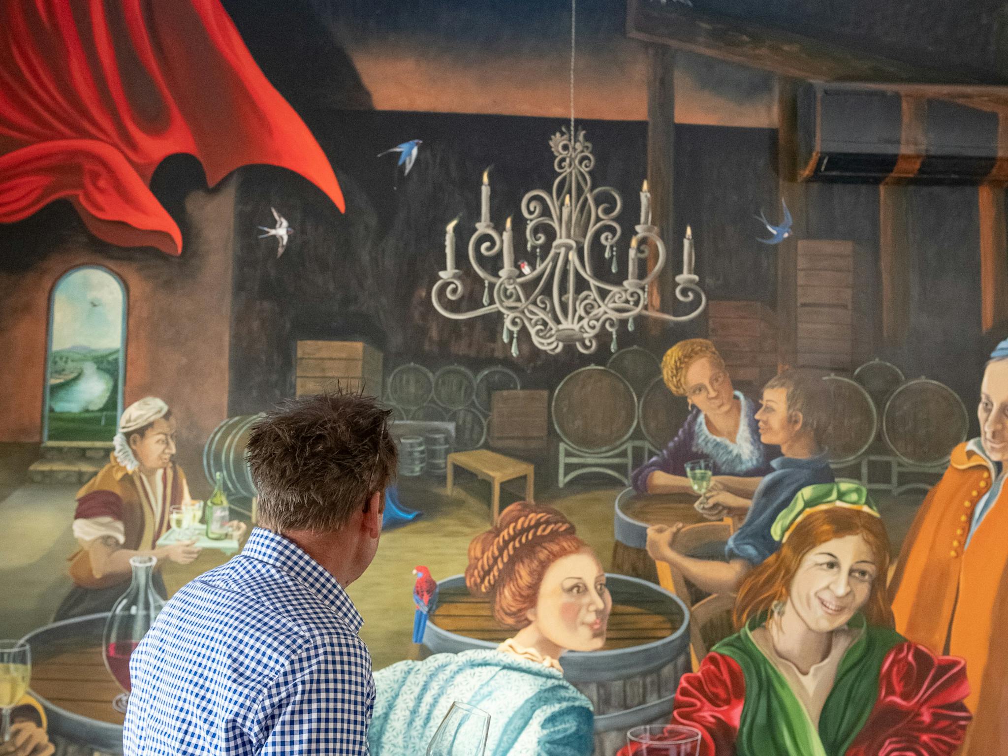 A featured mural of a Rennaissance Barrel Room.