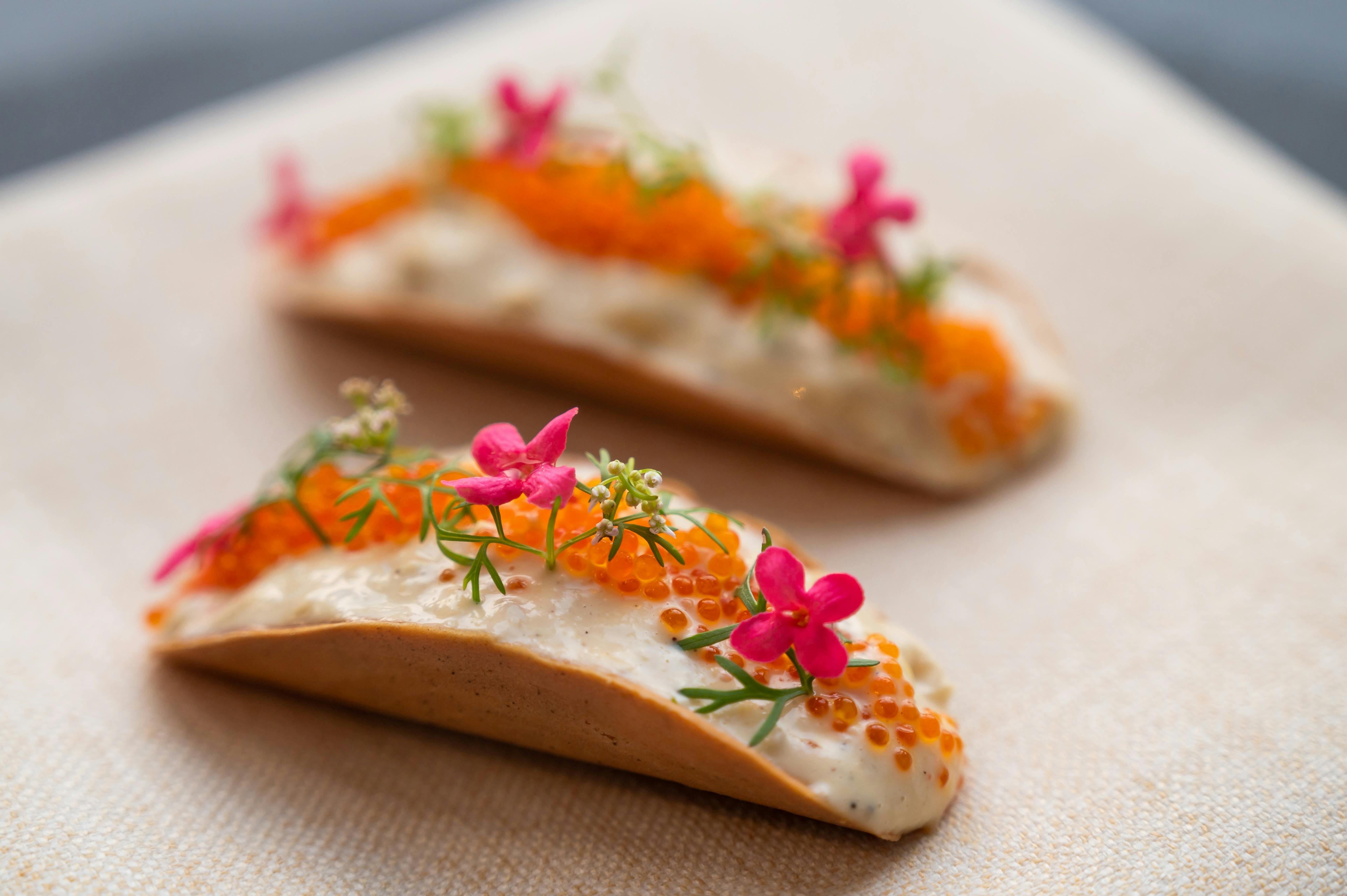 Mung bean savoury wafers with prawn tamalley,coconut, persimmon