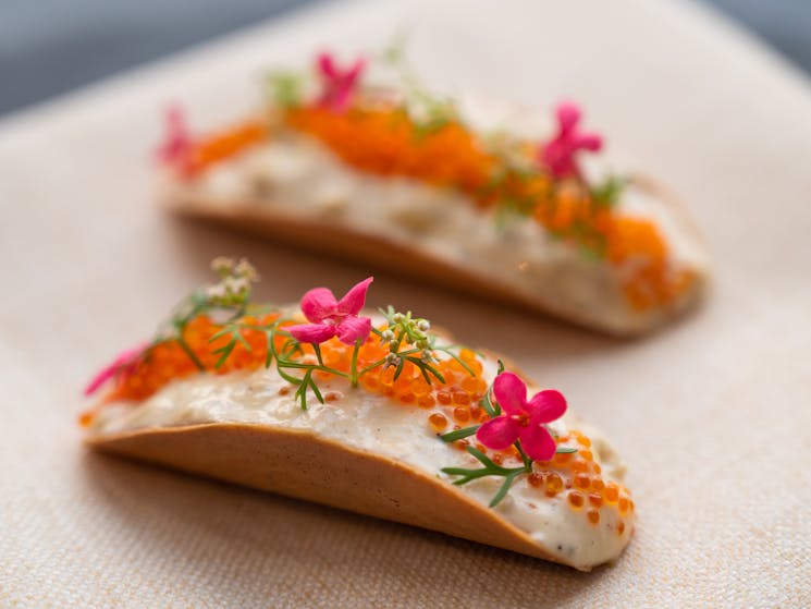 Mung bean savoury wafers with prawn tamalley,coconut, persimmon