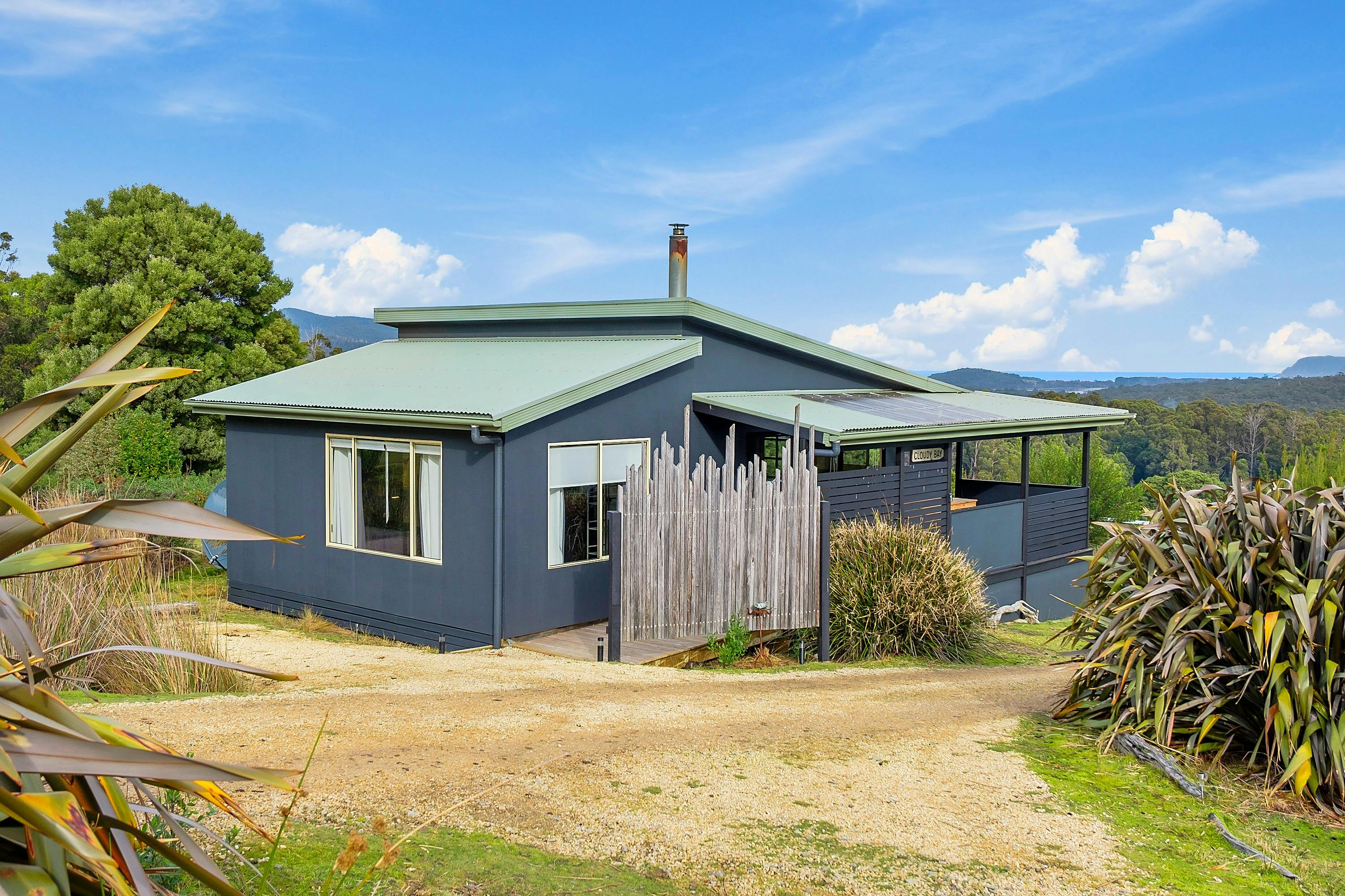 The Barrel cabin exterior, showcasing view to Cloudy Bay