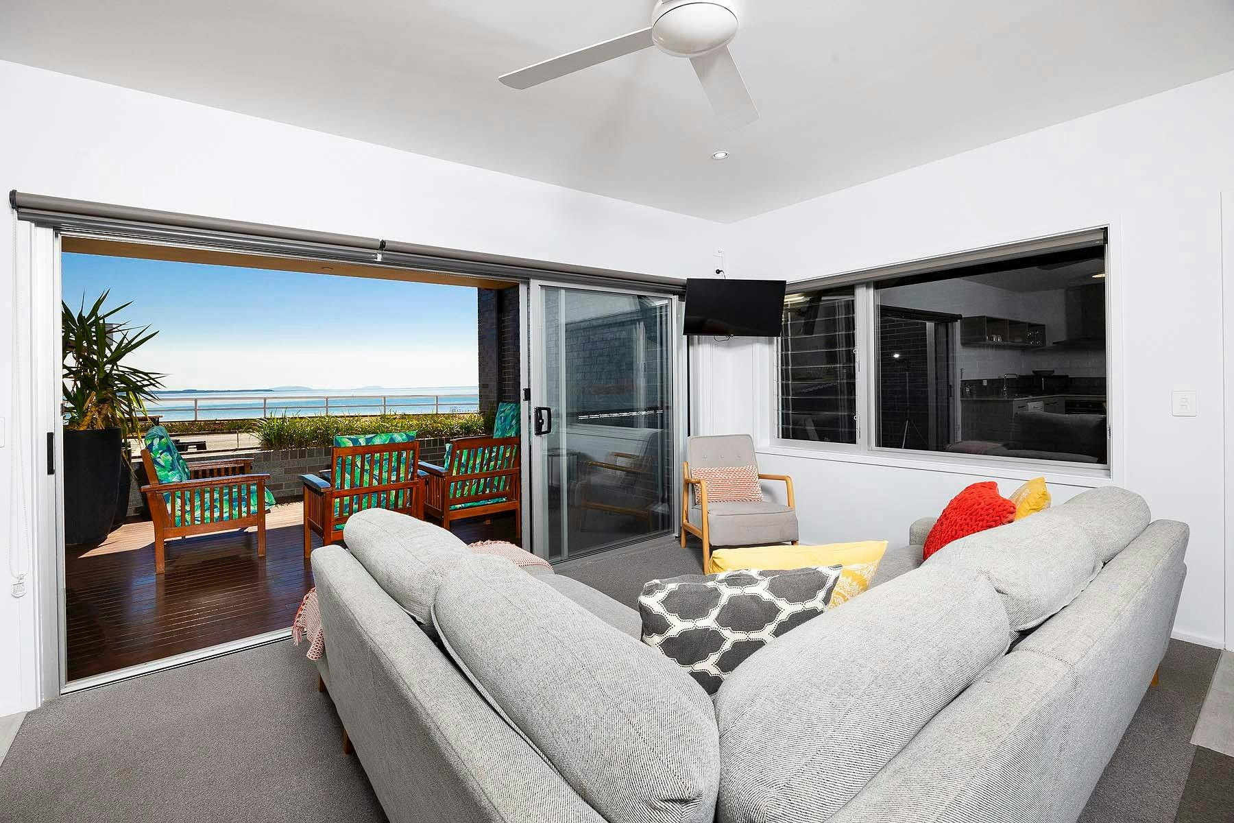 Lounge area leading out to balcony