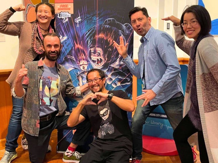 Comic artists pose for a fun photo at Comic Gong