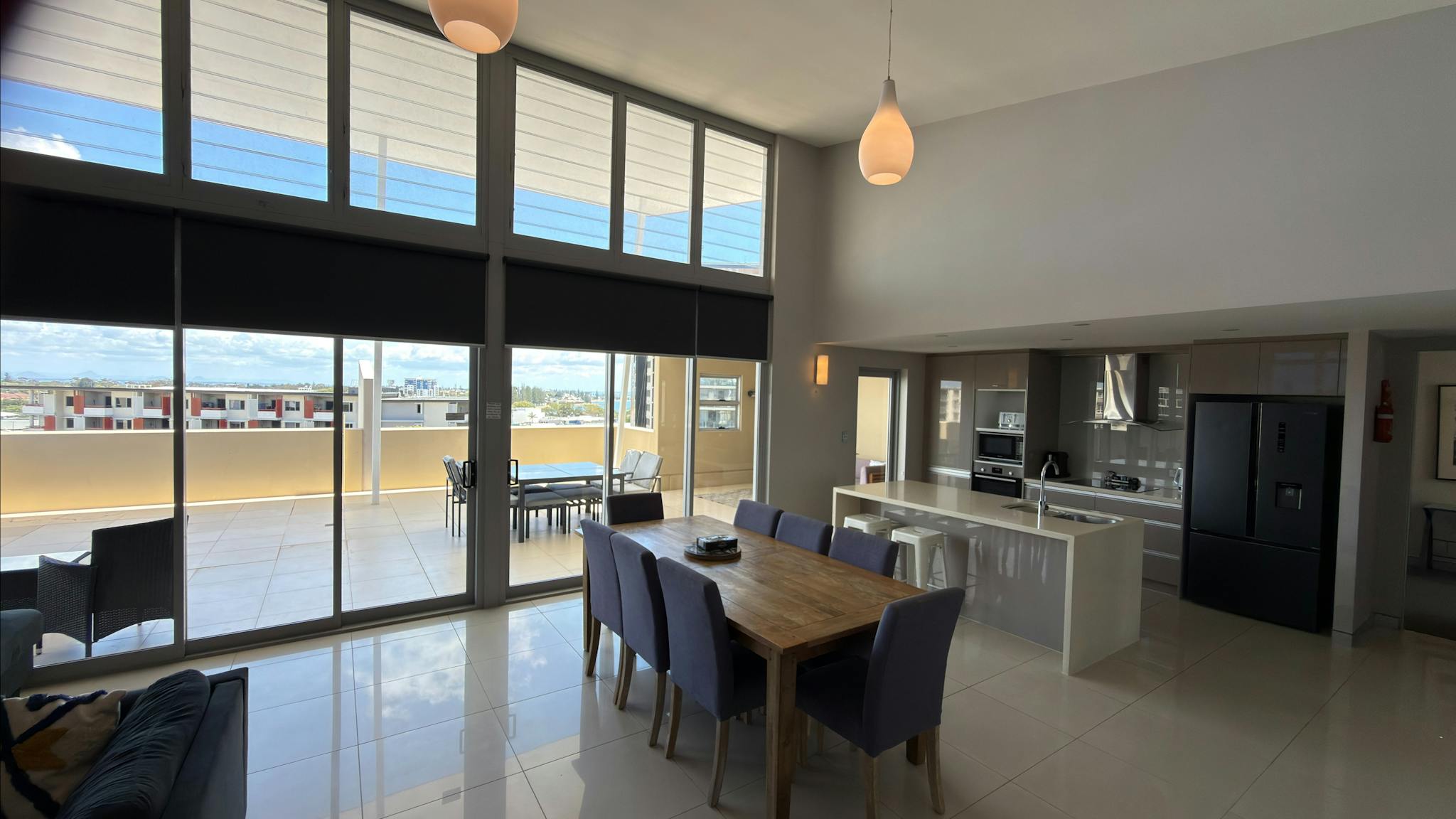 Photo of open plan living area and kitchen Photo of open plan living area and kitchen