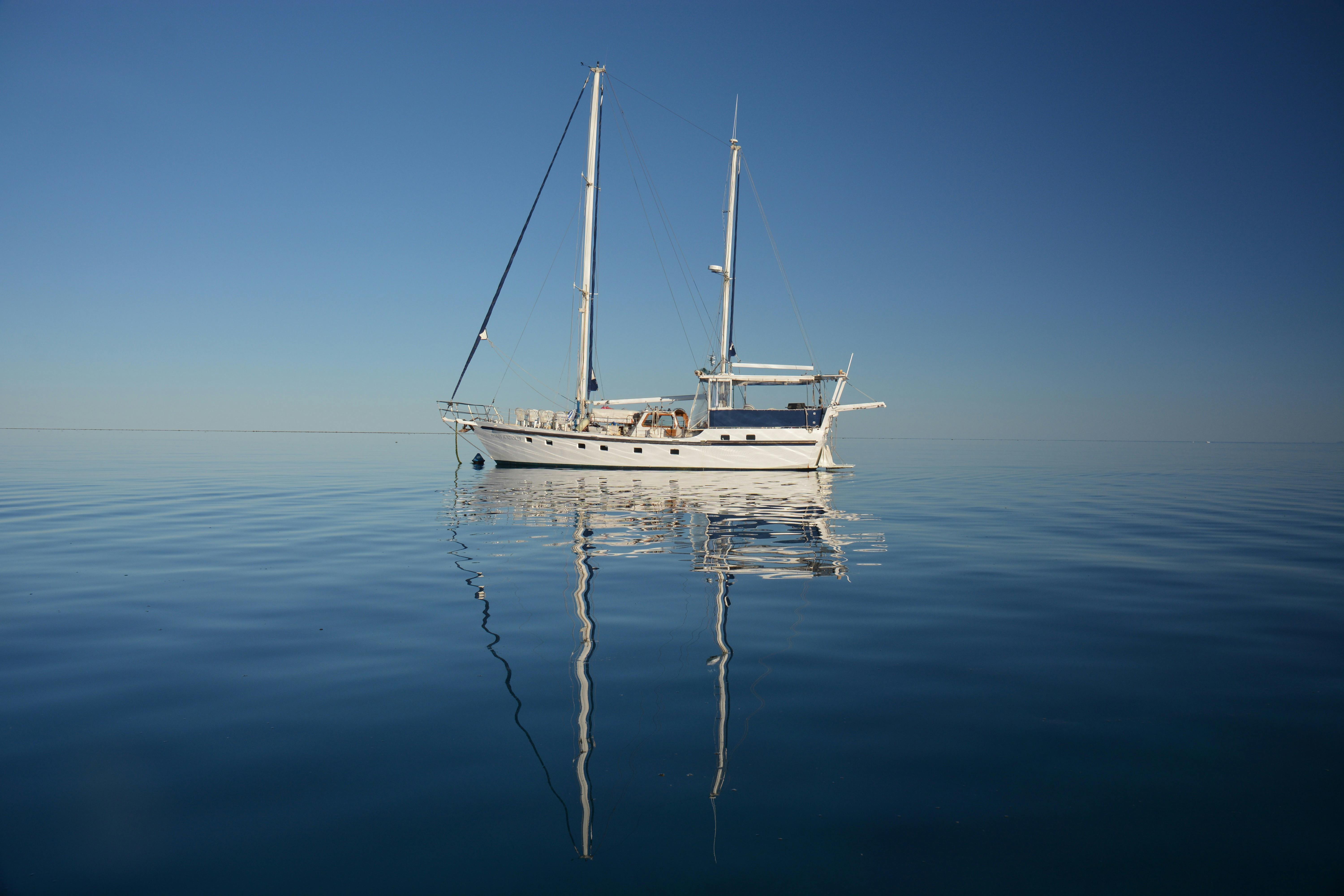 A mirror reflection of Sydney Sundancer on the outer Great barrier Reef