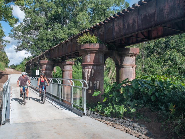 Passing the scenic Burringbar rail bridge on the Northern Rivers Rail Trail with Better By Bike