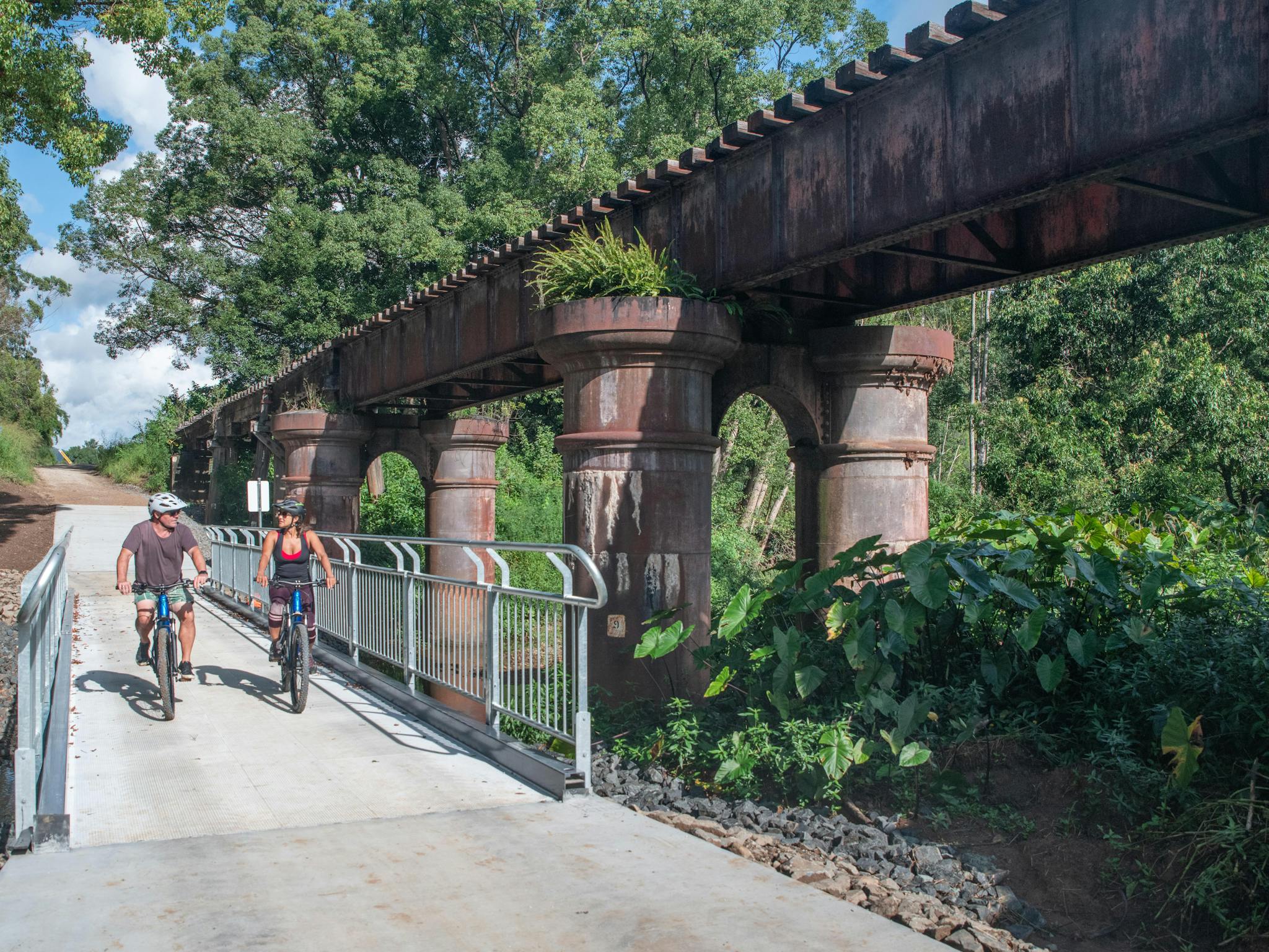 Passing the scenic Burringbar rail bridge on the Northern Rivers Rail Trail with Better By Bike