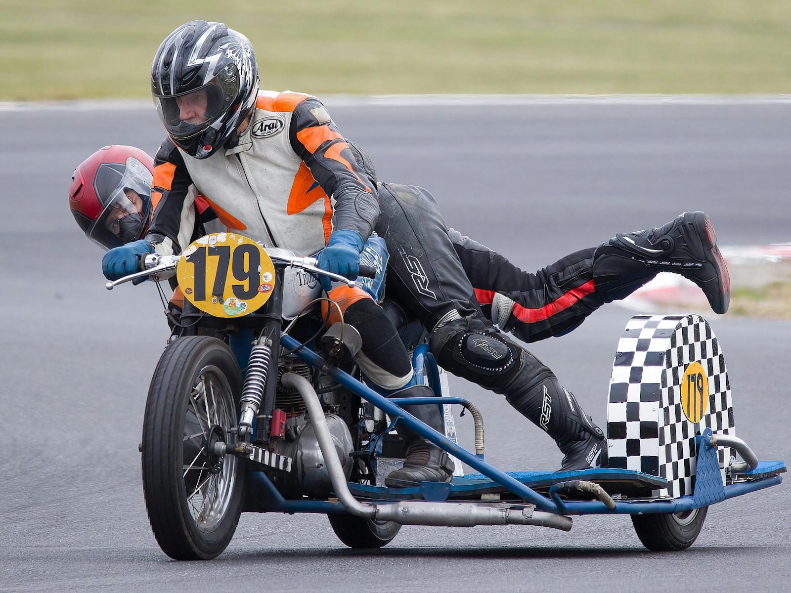 See it all - cars, sidecars and motorcycle races!
