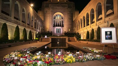Wreaths and the pool of reflection in the Commemorative Area at the Australian War Memorial