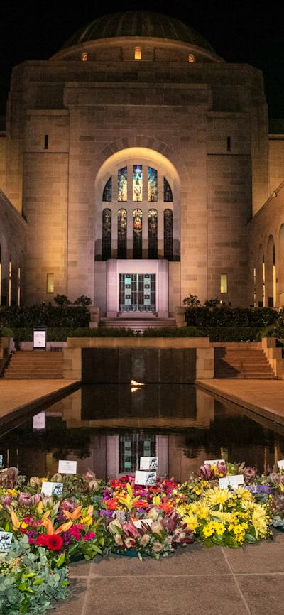 Wreaths and the pool of reflection in the Commemorative Area at the Australian War Memorial