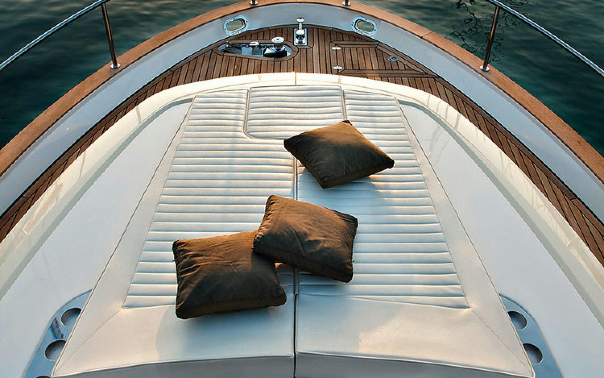 Luxury bow sundeck with cushions and teak on EV Arcadia private electric charter