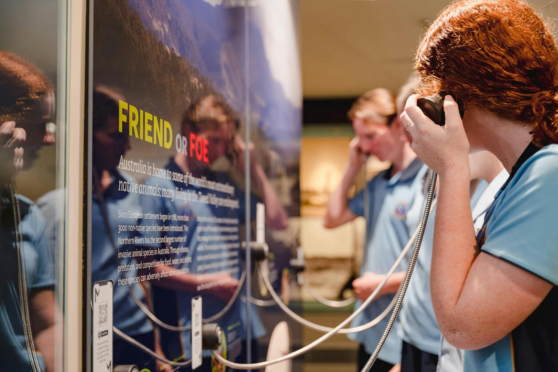 People listening to audio of native animals.